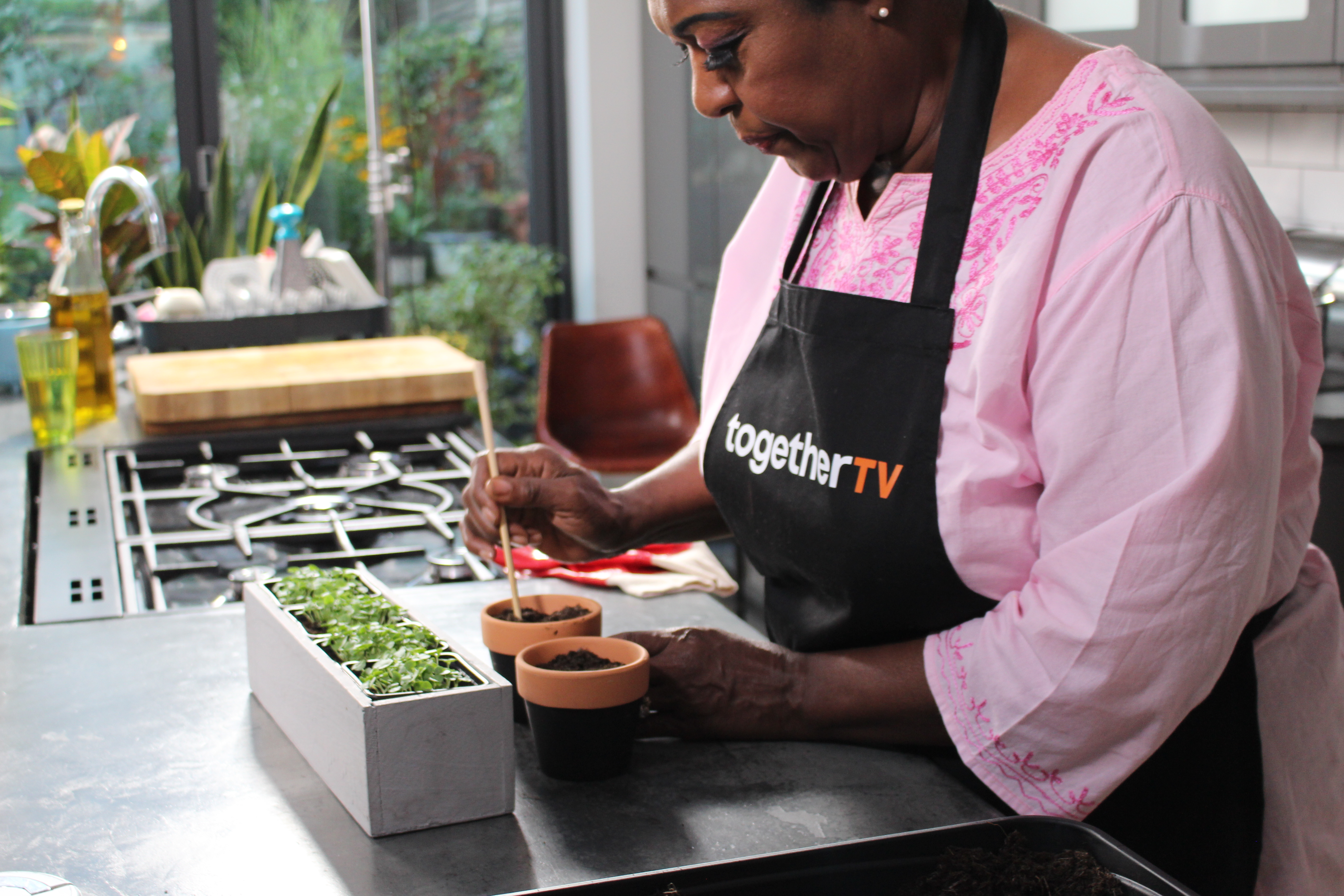 Rustie Lee sowing basil seeds