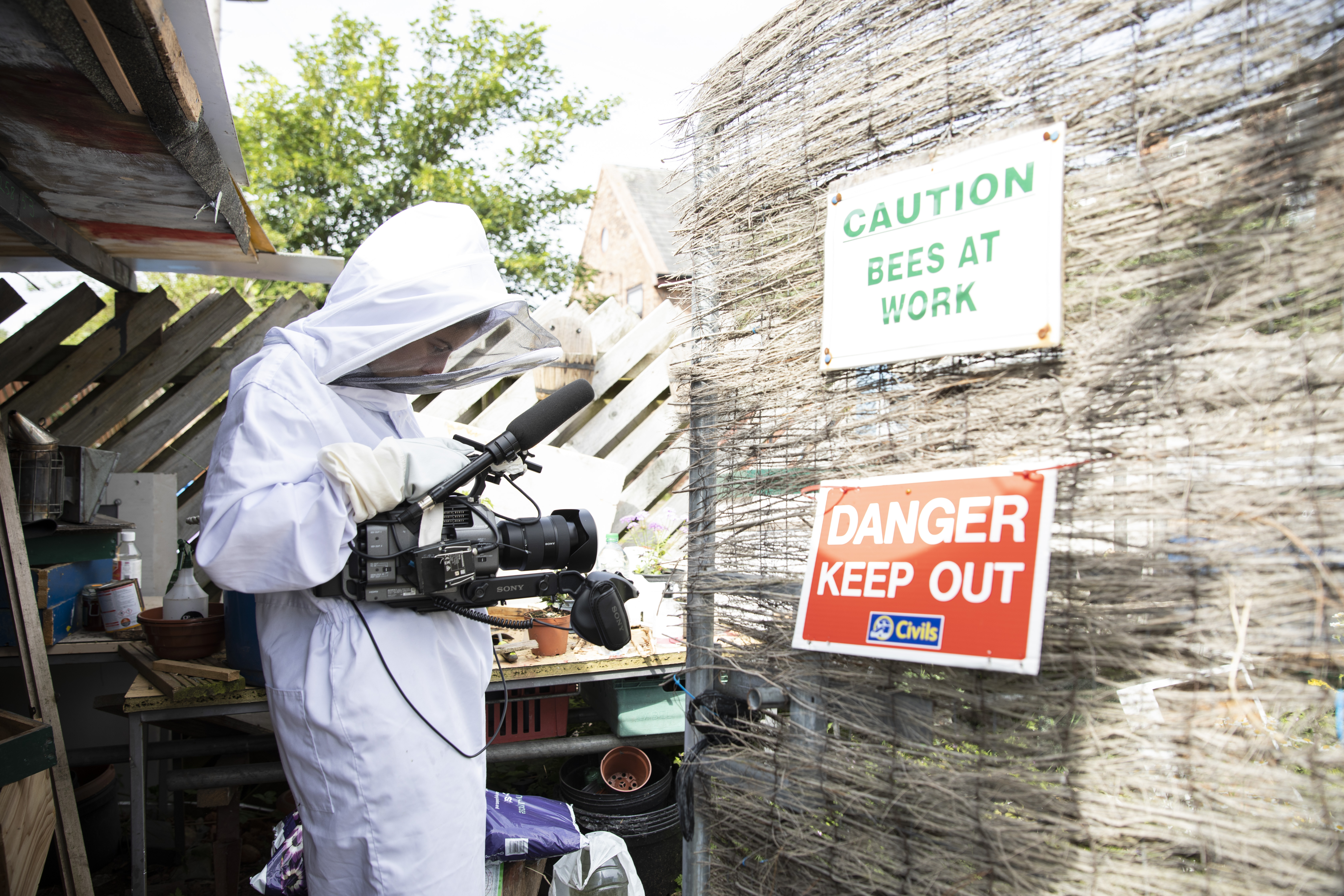 Ikram Ahmed behind the scenes shooting Barry the Beekeeper