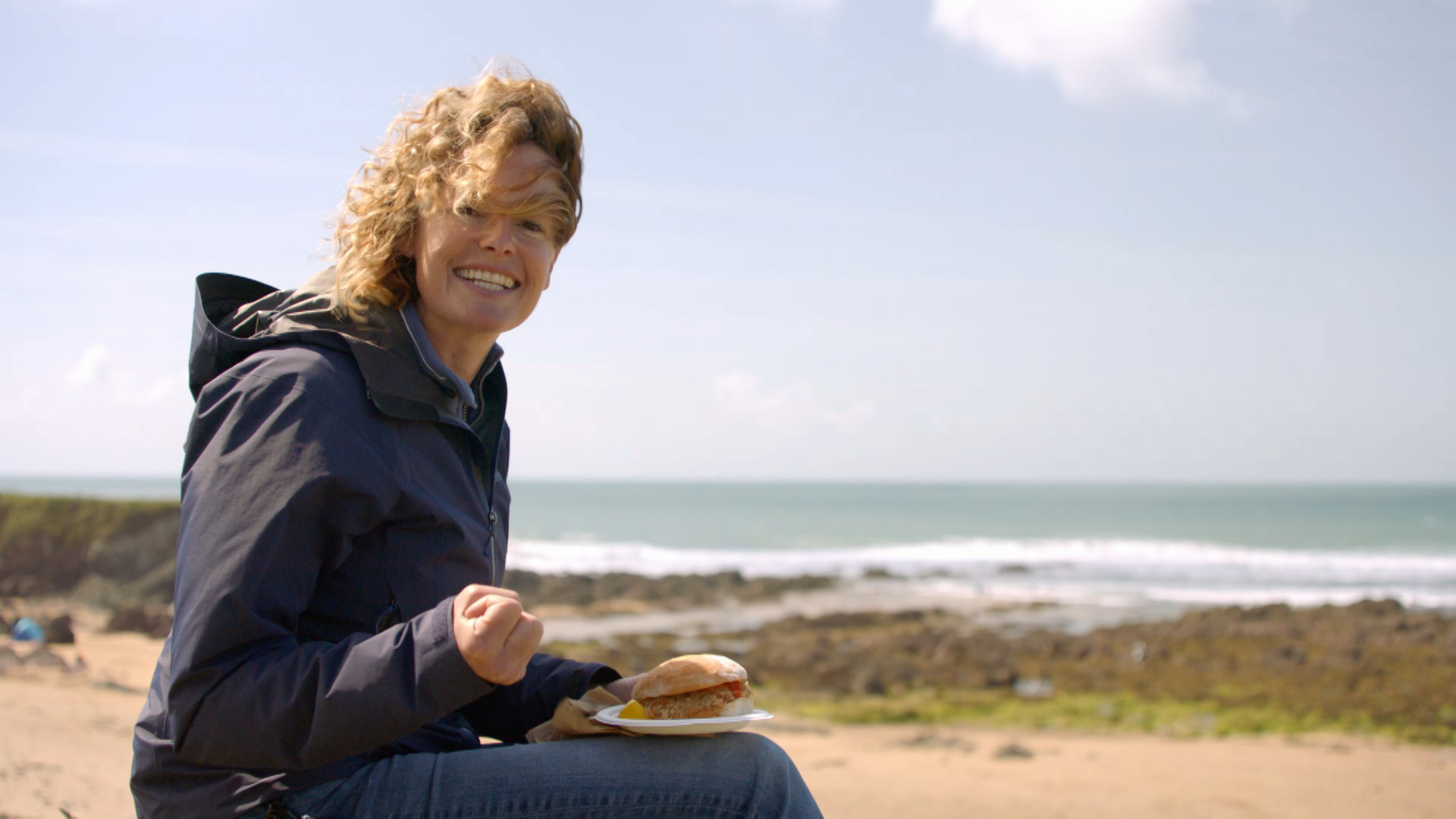 Kate Humble eating a sandwich